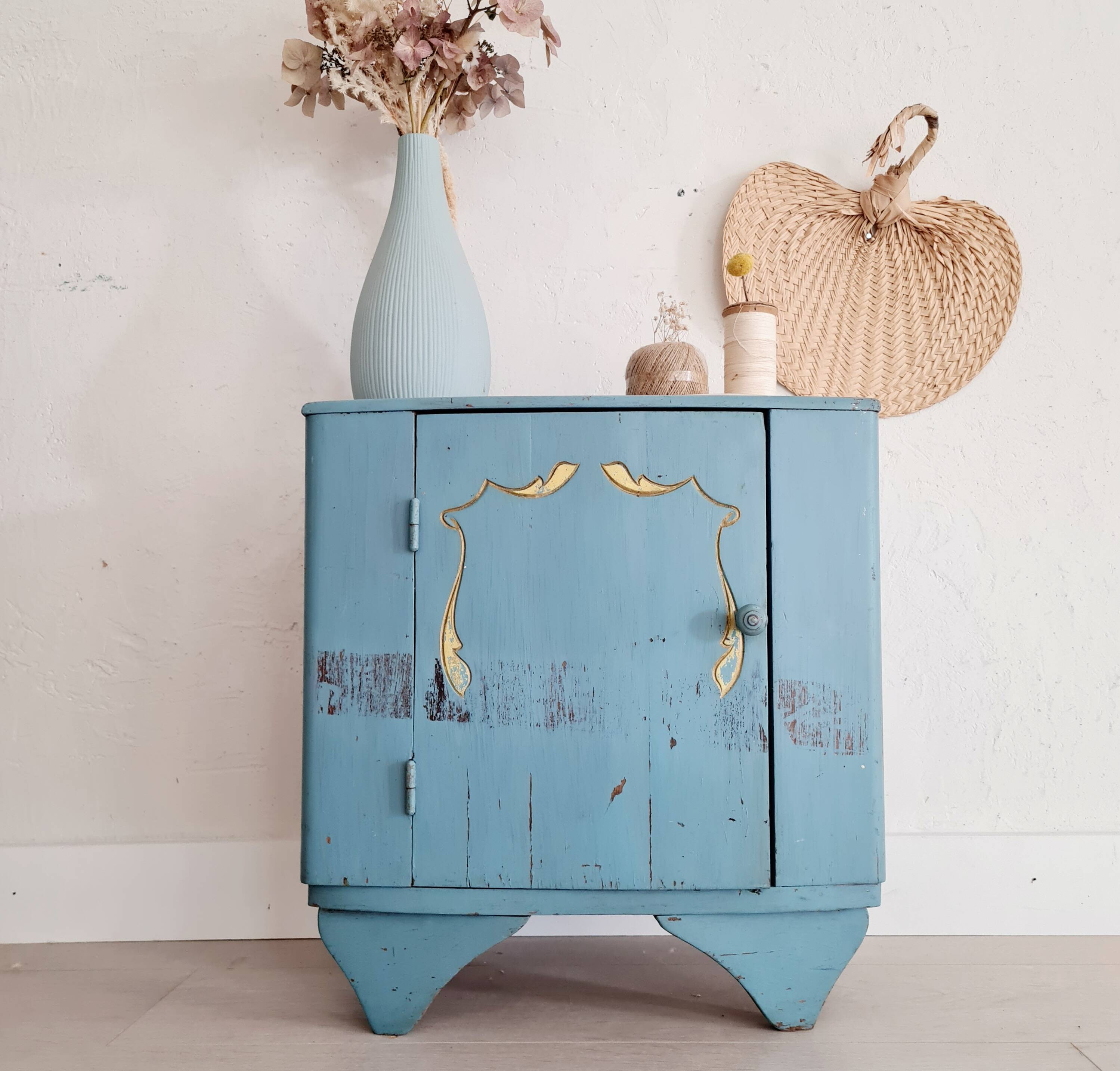 Old blue wood bedside table