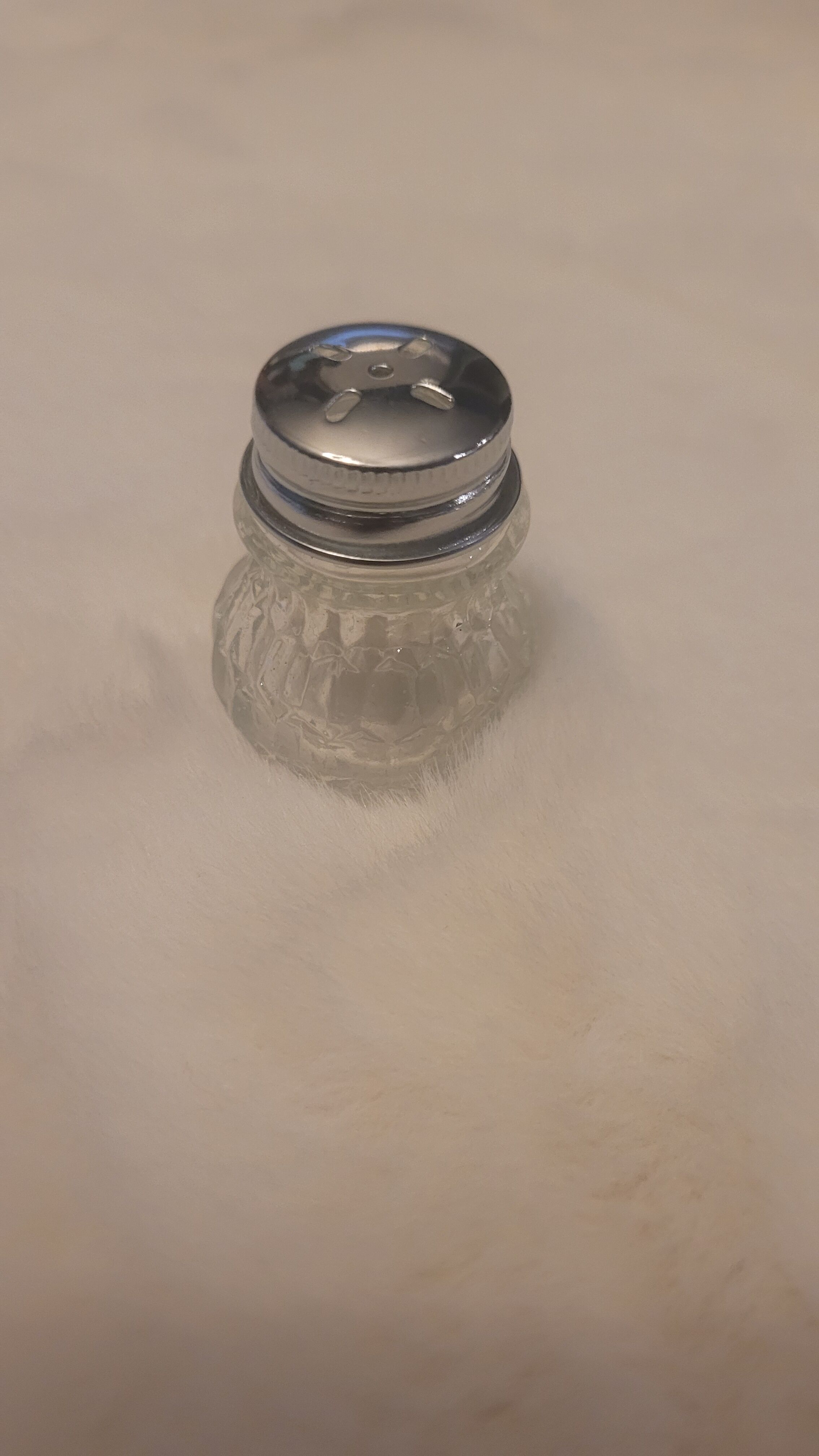 Salt and pepper and silver tray