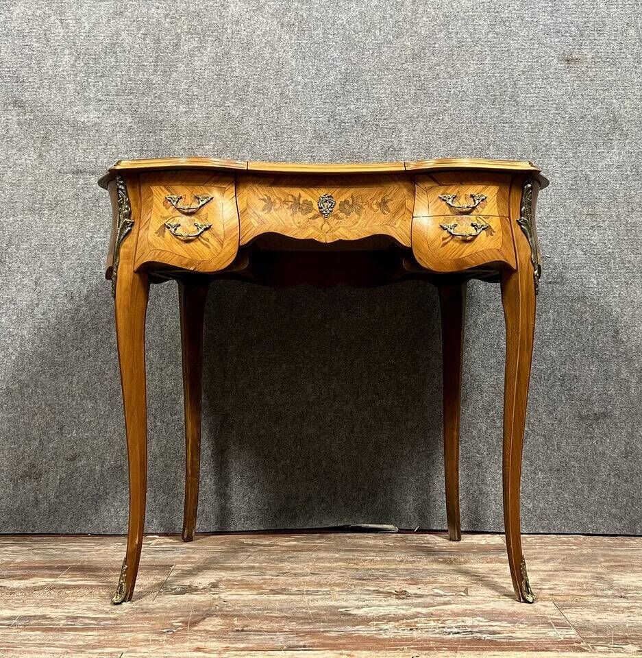 Louis XV style dressing table in "kidney" shape in rosewood decorated with marquetry flowers