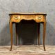 Louis XV style dressing table in "kidney" shape in rosewood decorated with marquetry flowers