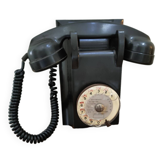 Old bakelite wall telephone