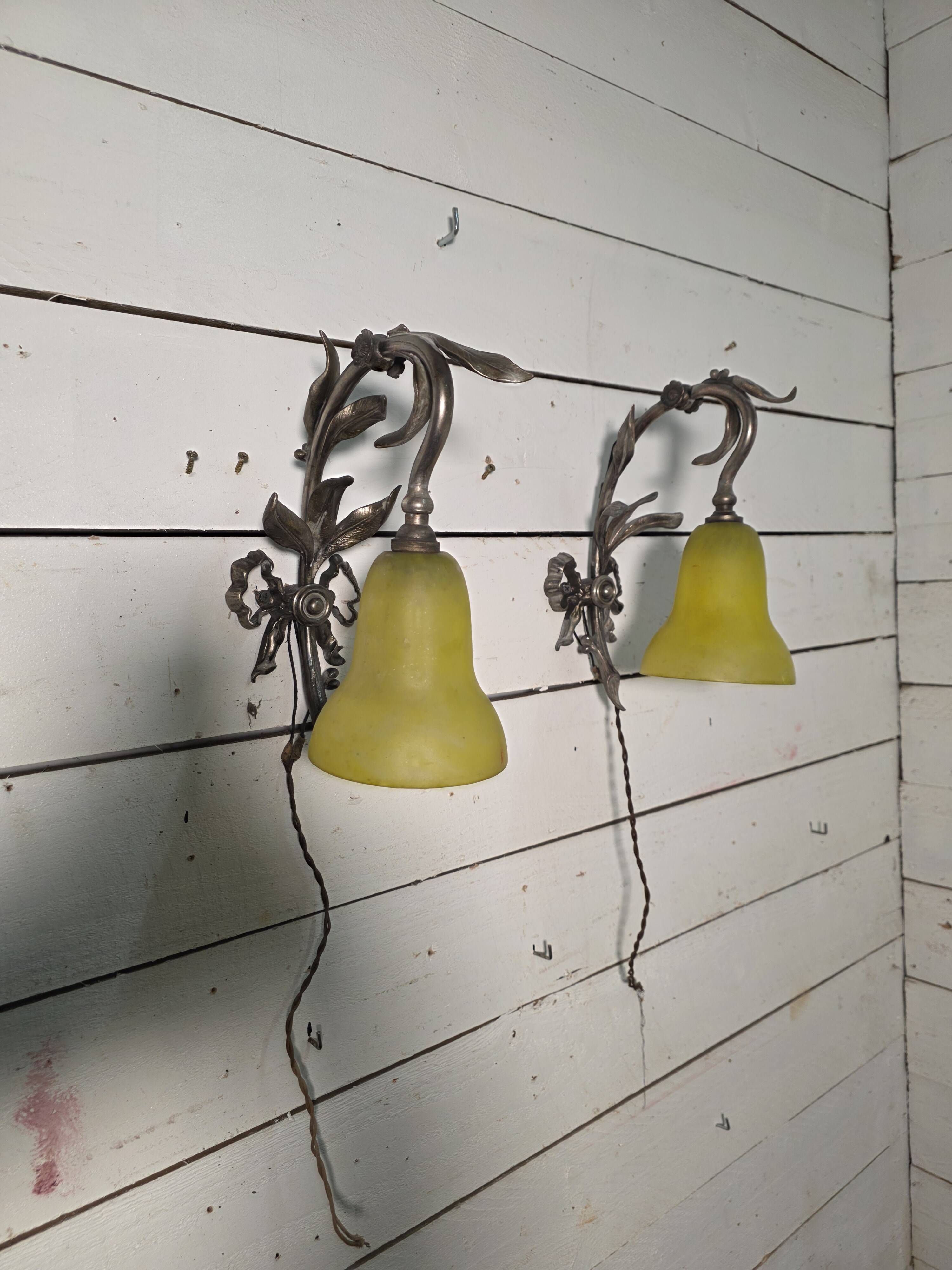 Pair of Louis XVI style bronze wall sconces