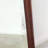 Antique beveled mirror on a wooden frame, 1930