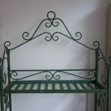 Folding green wrought iron shelf