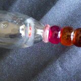 4 vintage flutes with coloured glass stems