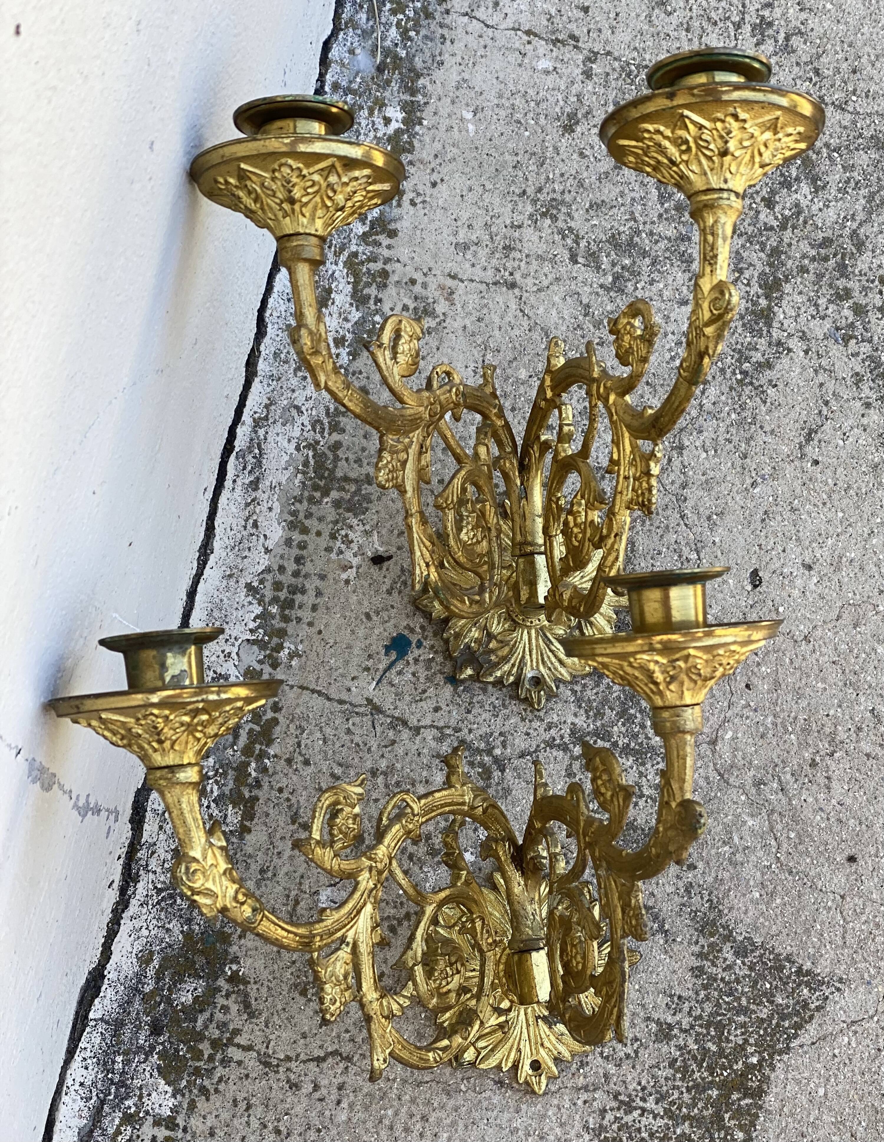 Pair of gilt bronze wall candlesticks
