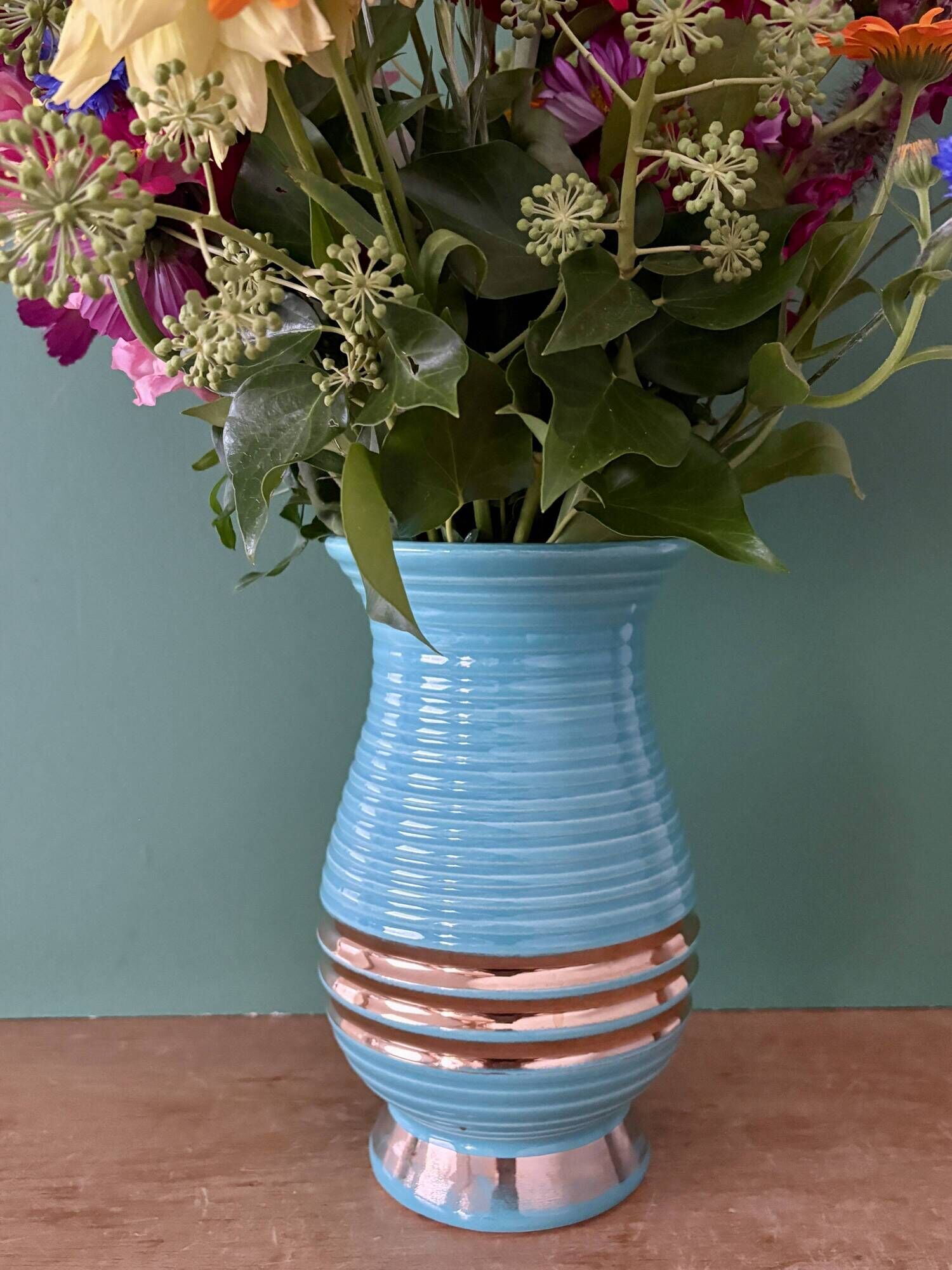 Vintage Art Deco vase in blue and gold ceramic