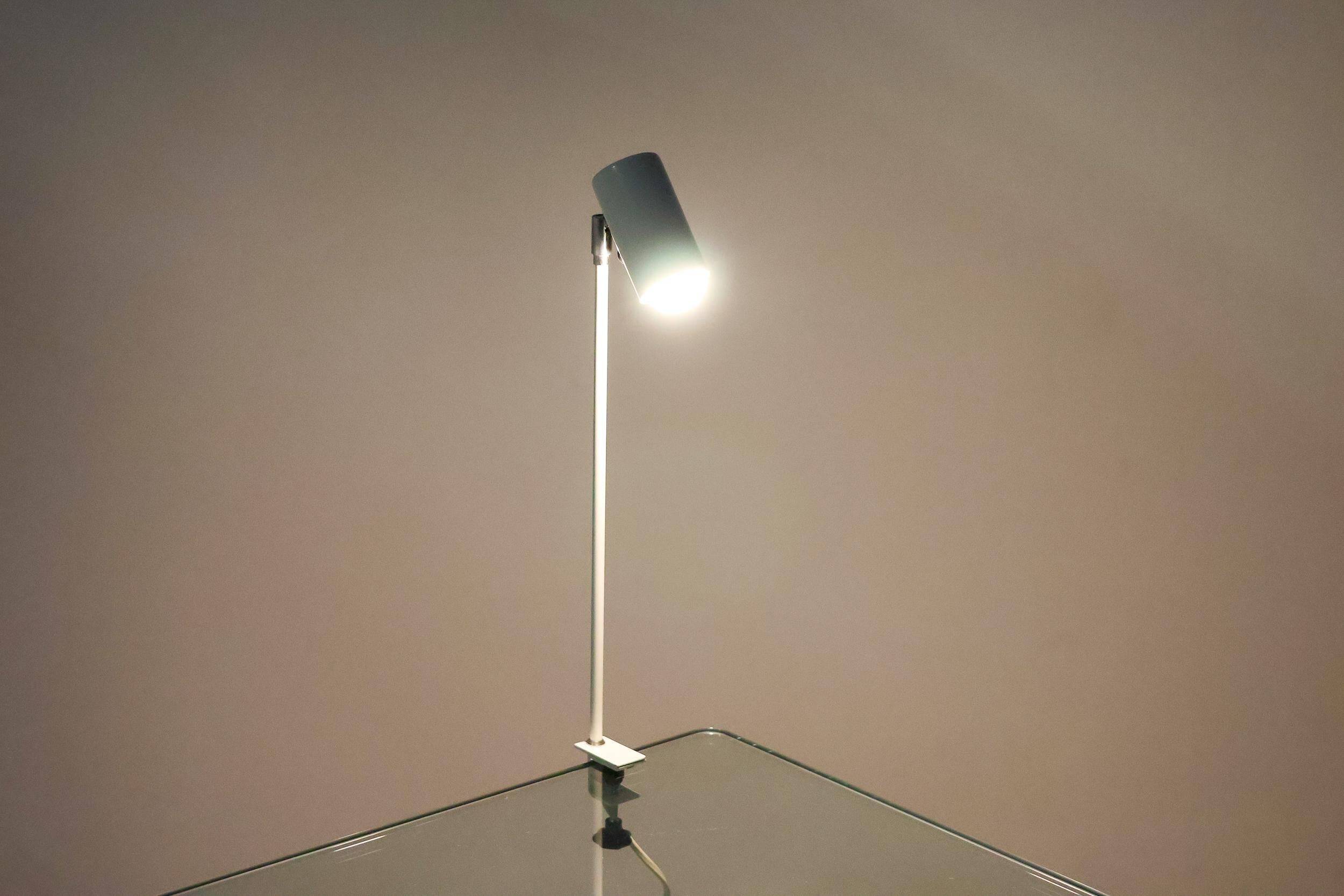 Modern Bauhaus style lamps in white, ideal for the library or study.