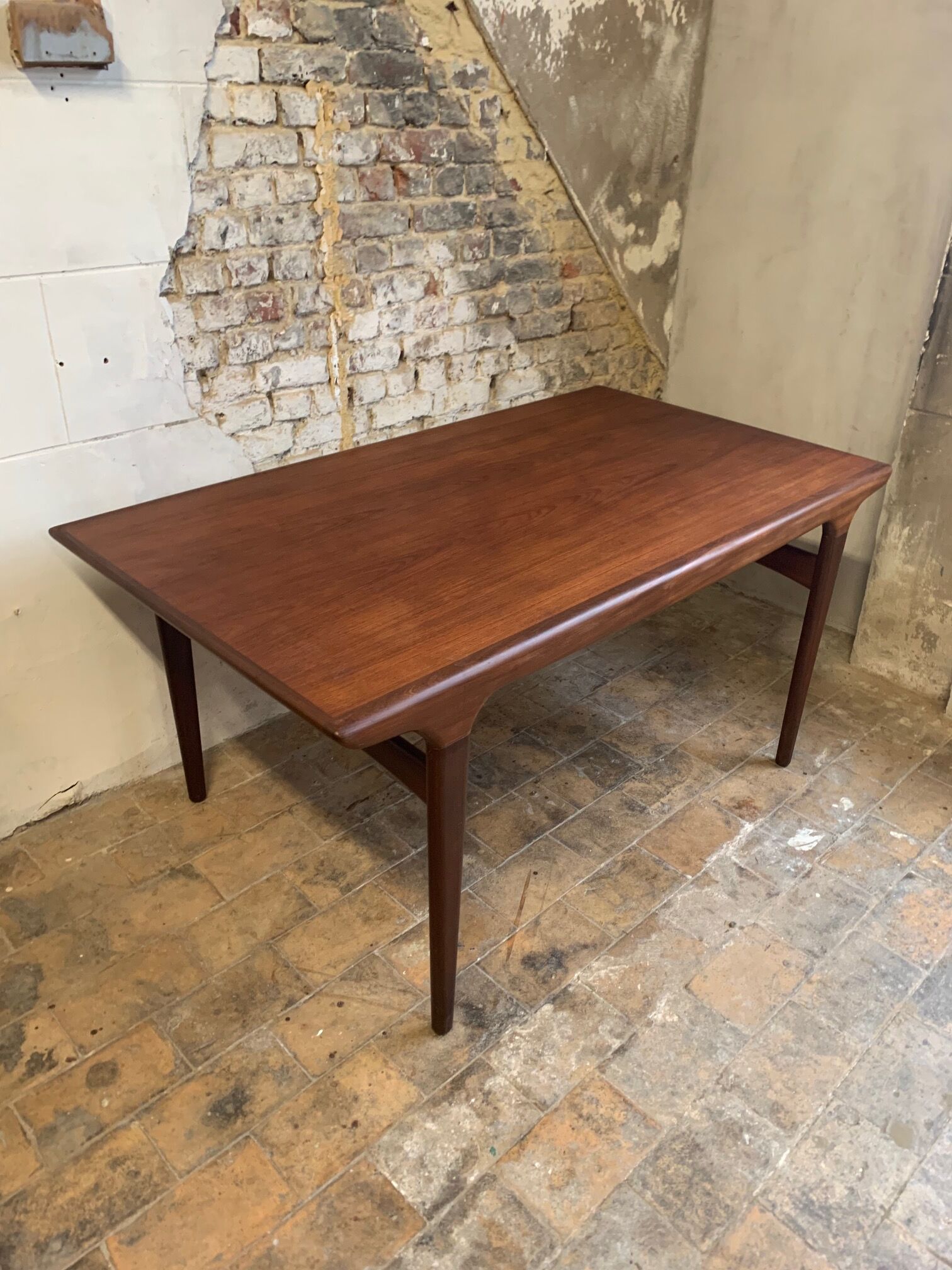 Dark teak dining table by Johannes Andersen for Uldum Møbelfabrik, Denmark