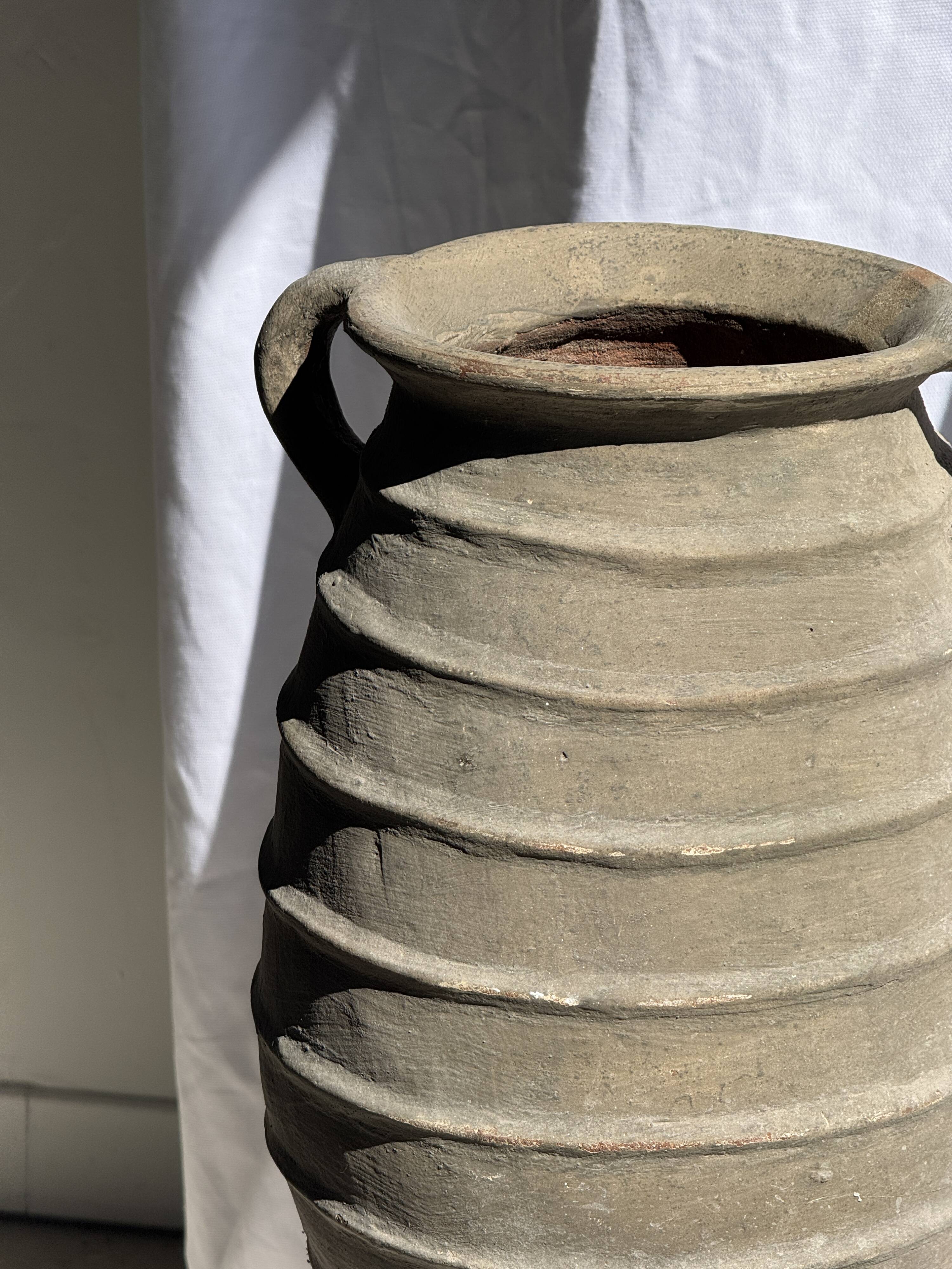 Large oval vase with double handles, featuring raised grey-beige stripes, H42 D28.
