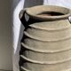 Large oval vase with double handles, featuring raised grey-beige stripes, H42 D28.