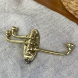 Coat hook with three-pronged folding hooks in brass