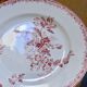 Round antique plate made of pink ironstone, signed Sarreguemines, Fontanges collection.