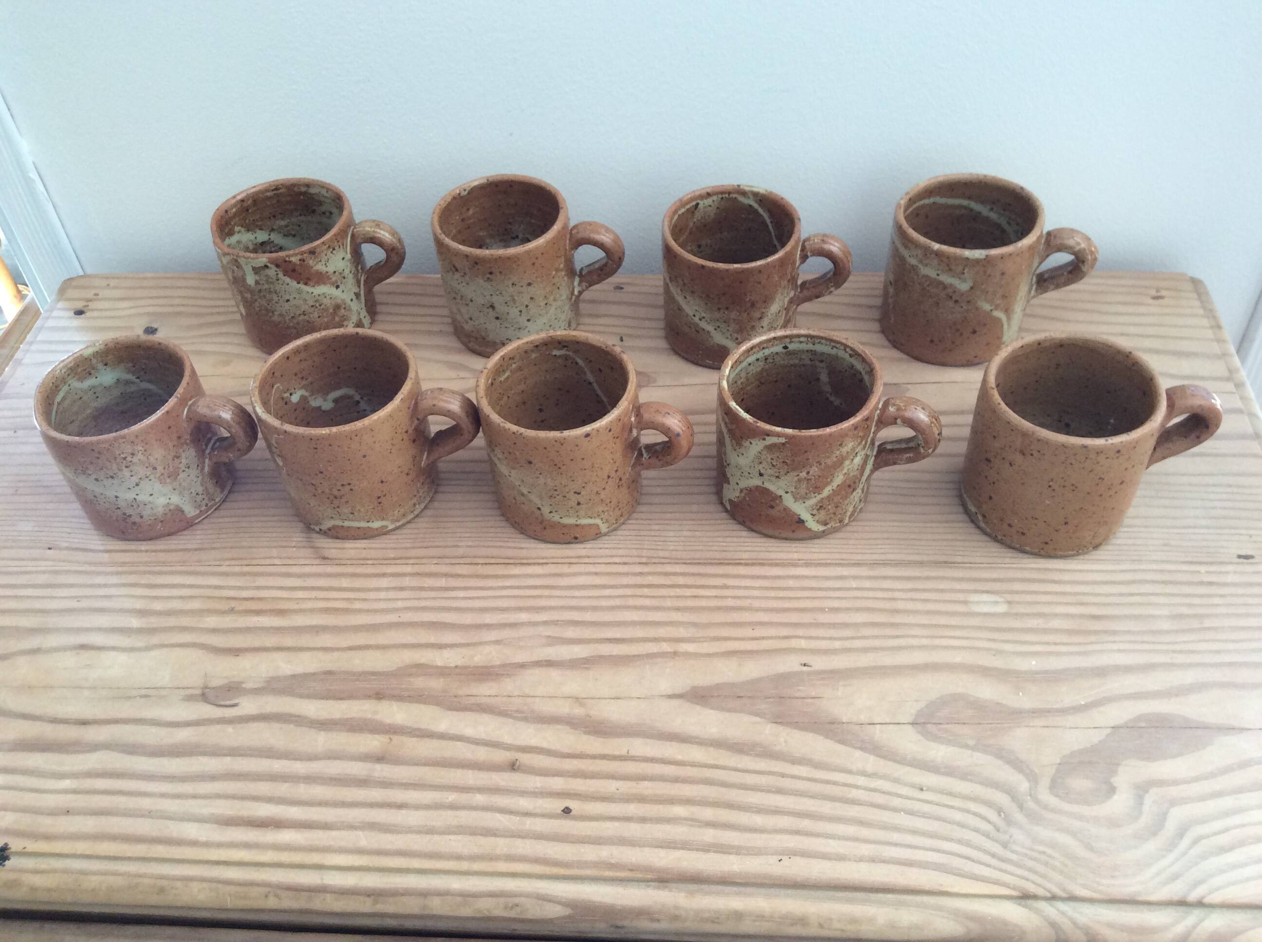 9 stoneware coffee cups