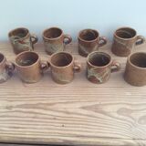 9 stoneware coffee cups