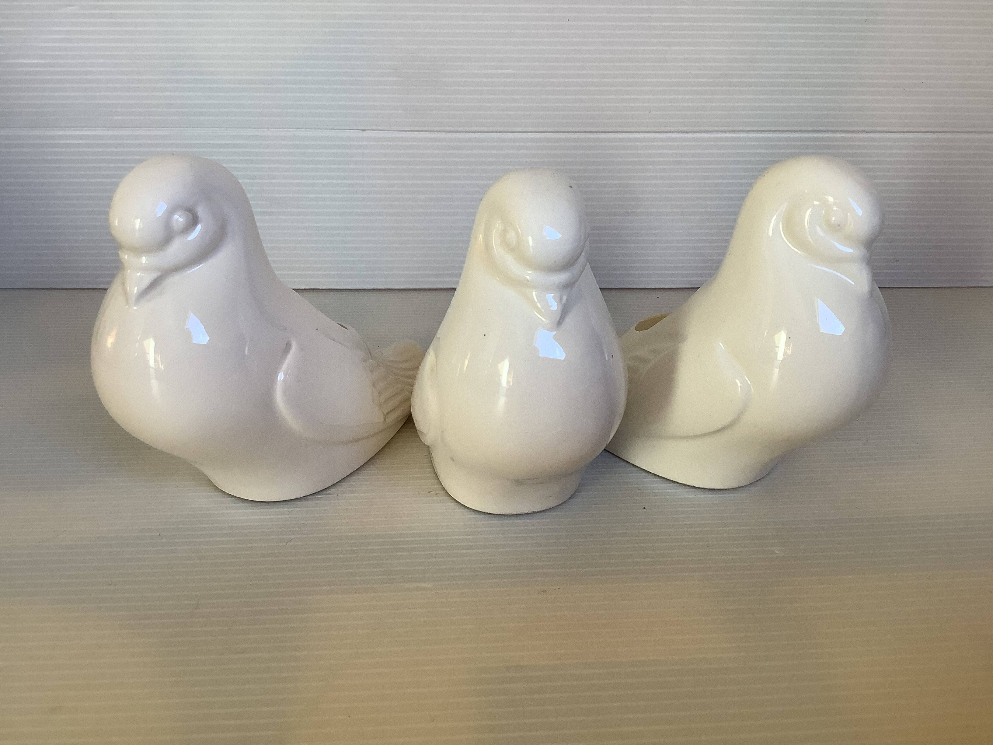 Seven dove bird candle holders