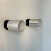Pair of vintage wall lights, chrome-plated metal and Bakelite, France 1960.