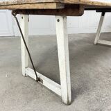 Large 1940s-style outdoor dining table