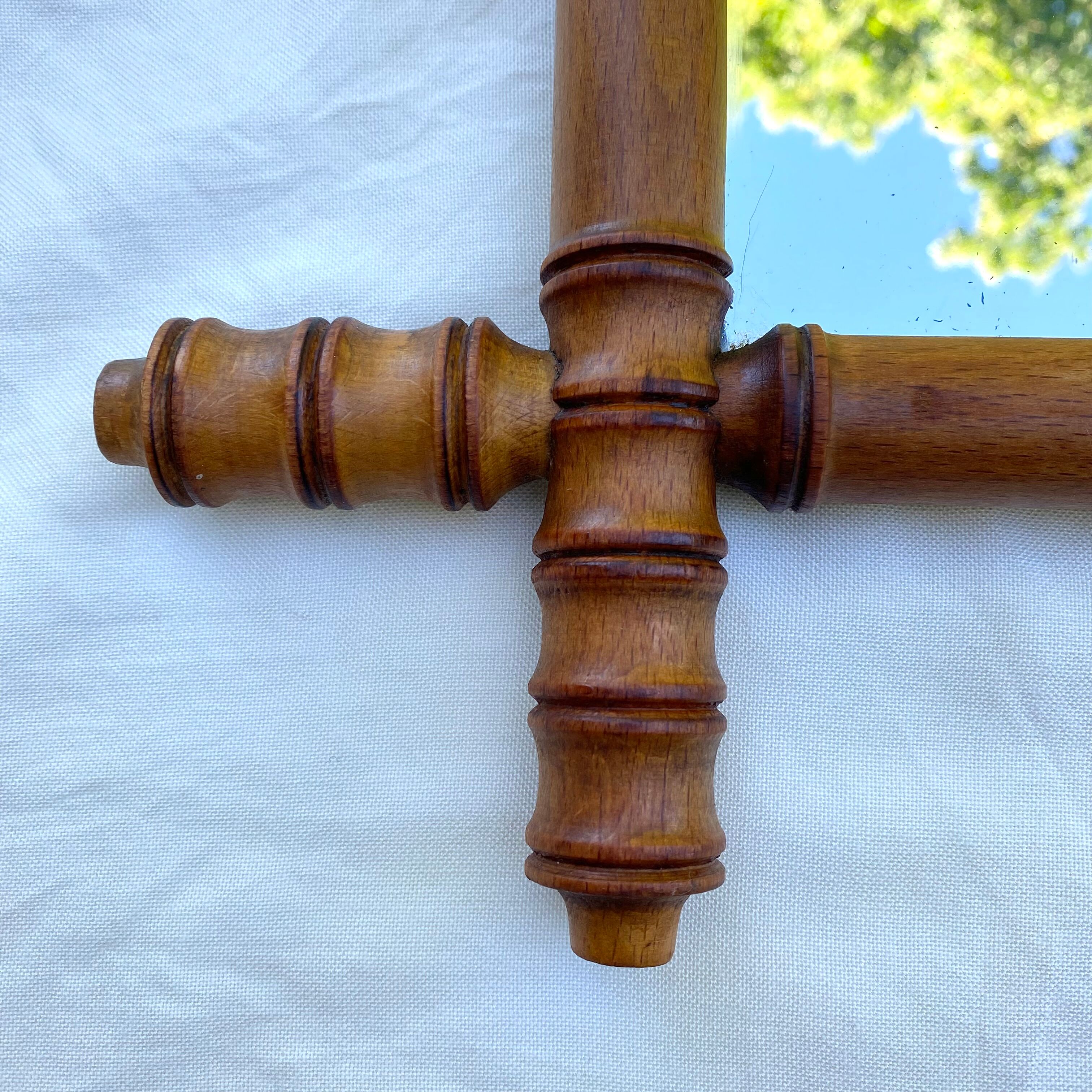 Antique mercury mirror in bamboo-style wood