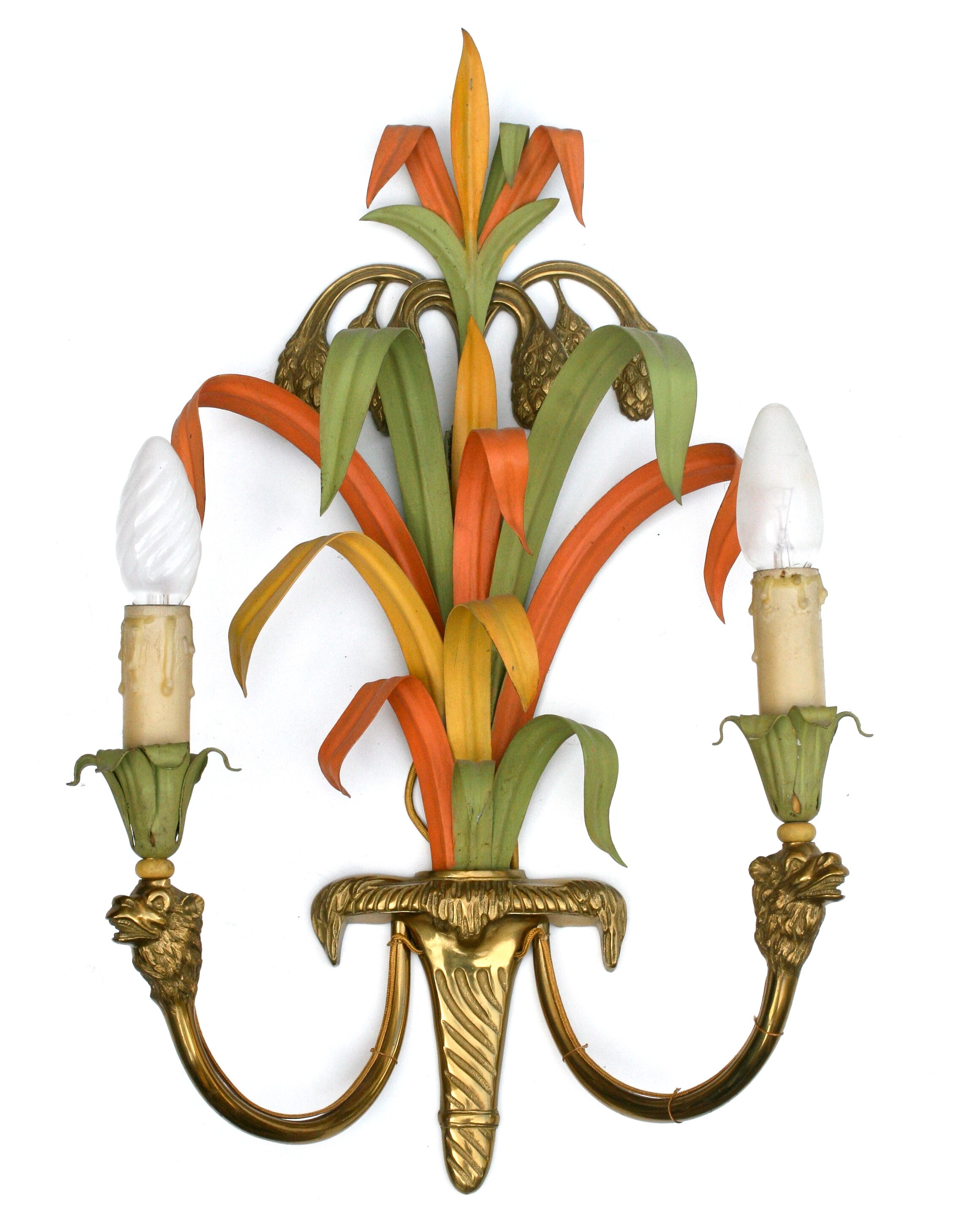 Maison Baguès, three bronze appliques decorated with camel heads and palm leaves