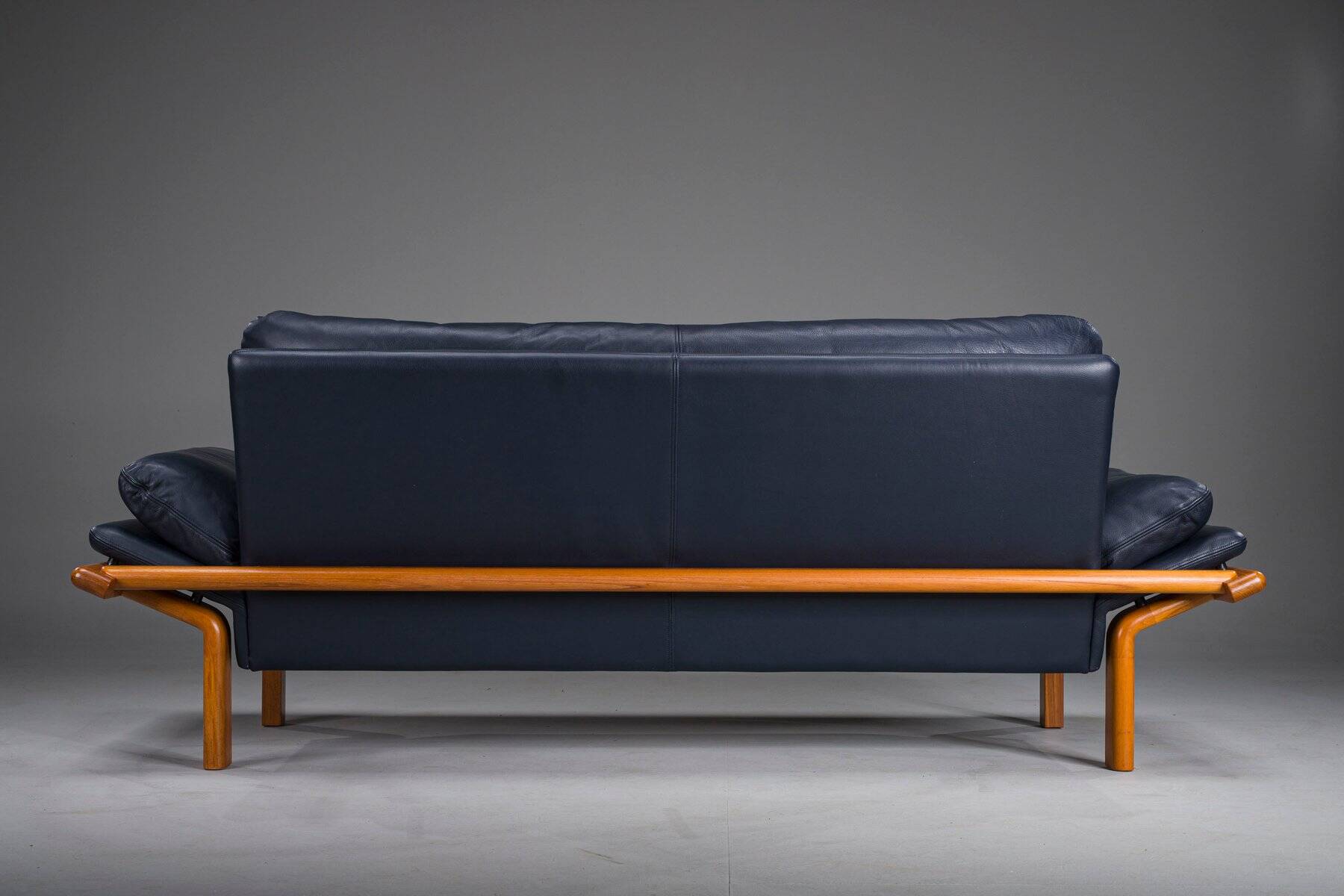 Danish teak and navy blue leather 3-seater sofa from Komfort, 1970s