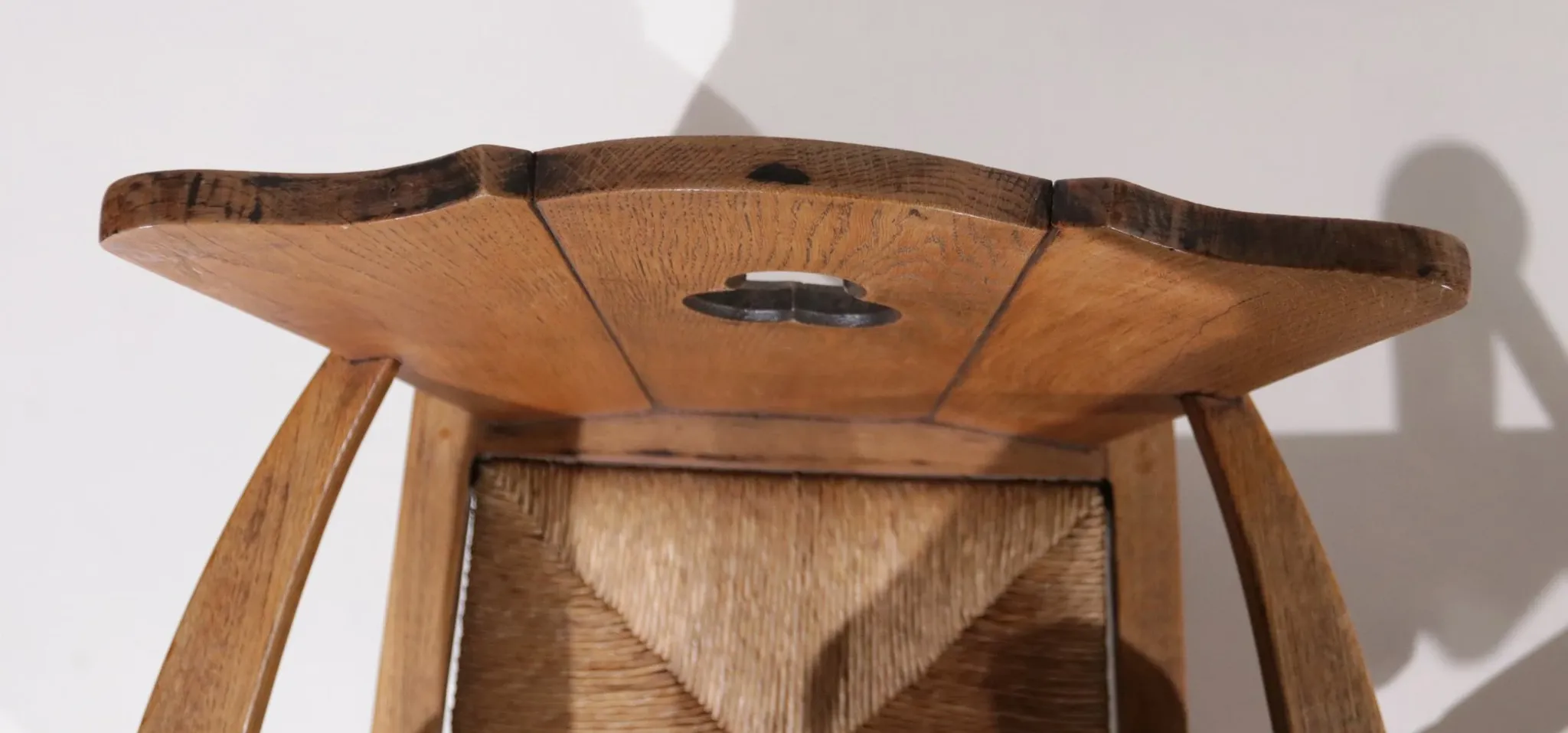 Pair of brutalist oak throne chairs with rush seats – Netherlands, 1930s