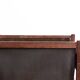Danish magazine rack in rosewood and leather, 1960.