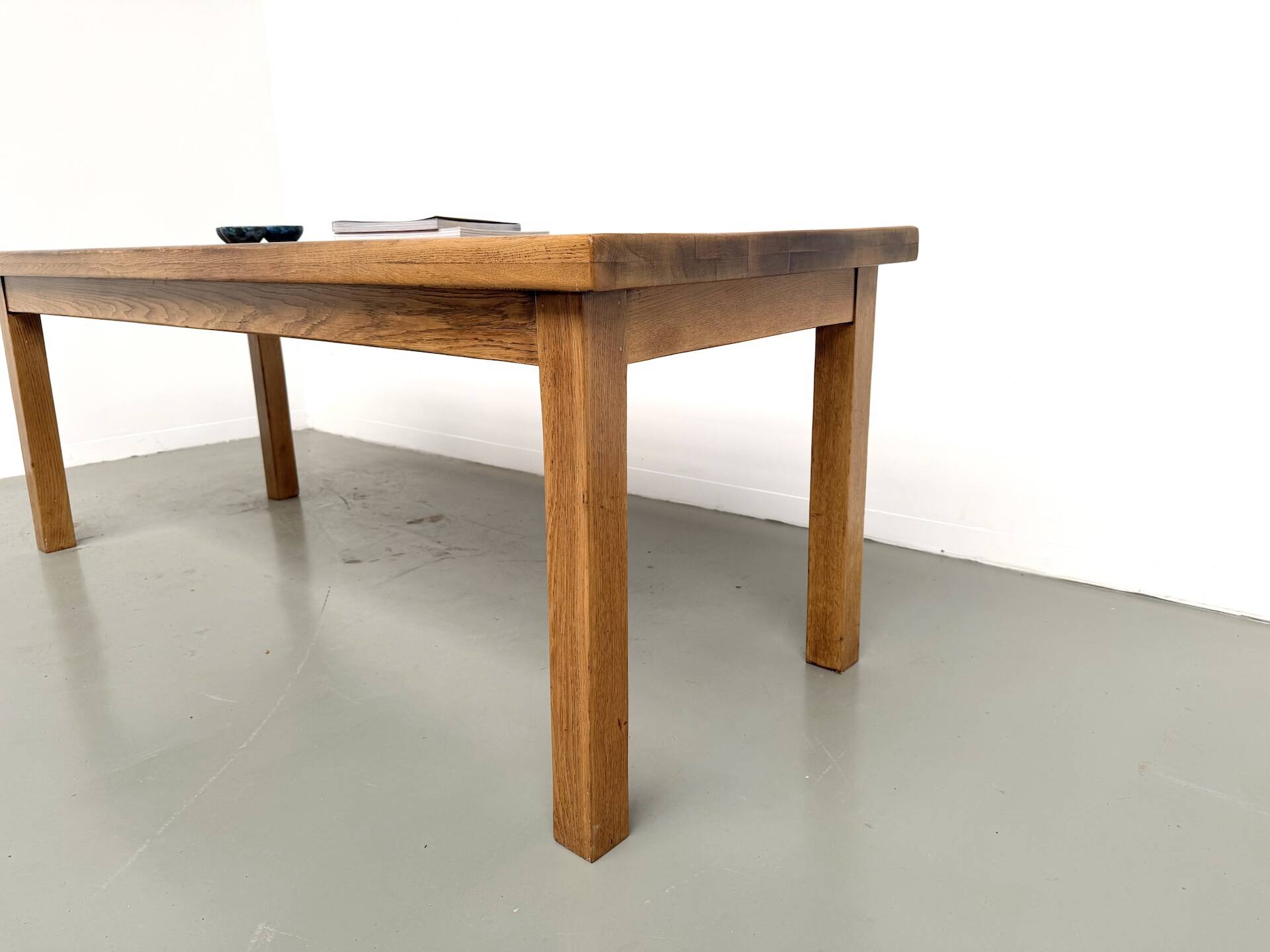 Solid oak farmhouse table, square legs.
