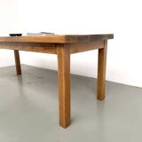 Solid oak farmhouse table, square legs.