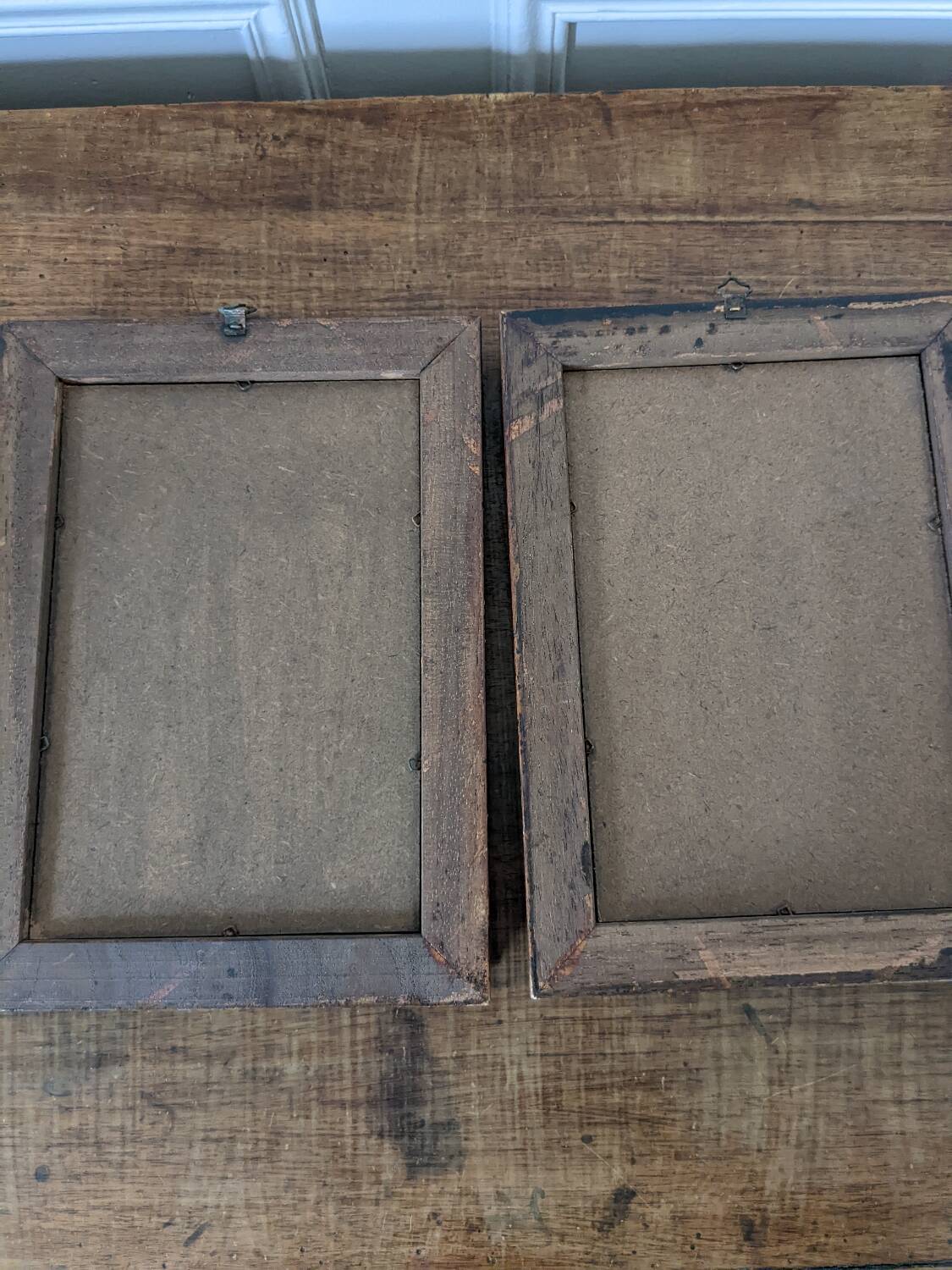 Two reproduction frames of engravings