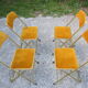 Série de 4 chaises pliantes métal doré et tissus