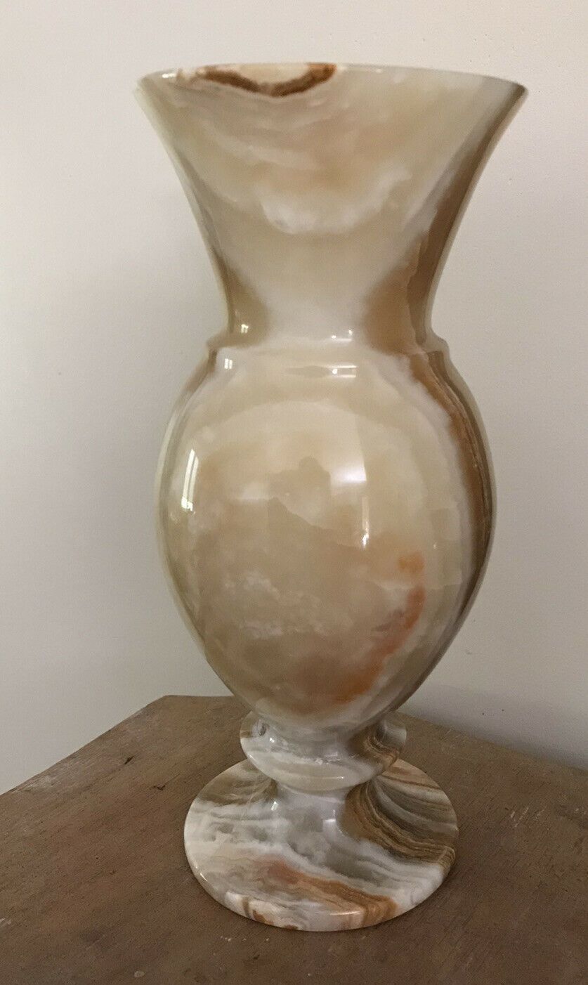 Vintage vase in marbled onyx stone shades of beige and brown