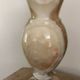 Vintage vase in marbled onyx stone shades of beige and brown