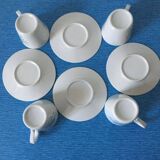 Ensemble de 4 tasses et leur soucoupe en porcelaine, motif méduse signé yves blayo
