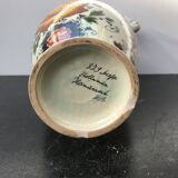 Ancient Delft vase with white ceramics decor vintage flowers