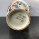 Ancient Delft vase with white ceramics decor vintage flowers