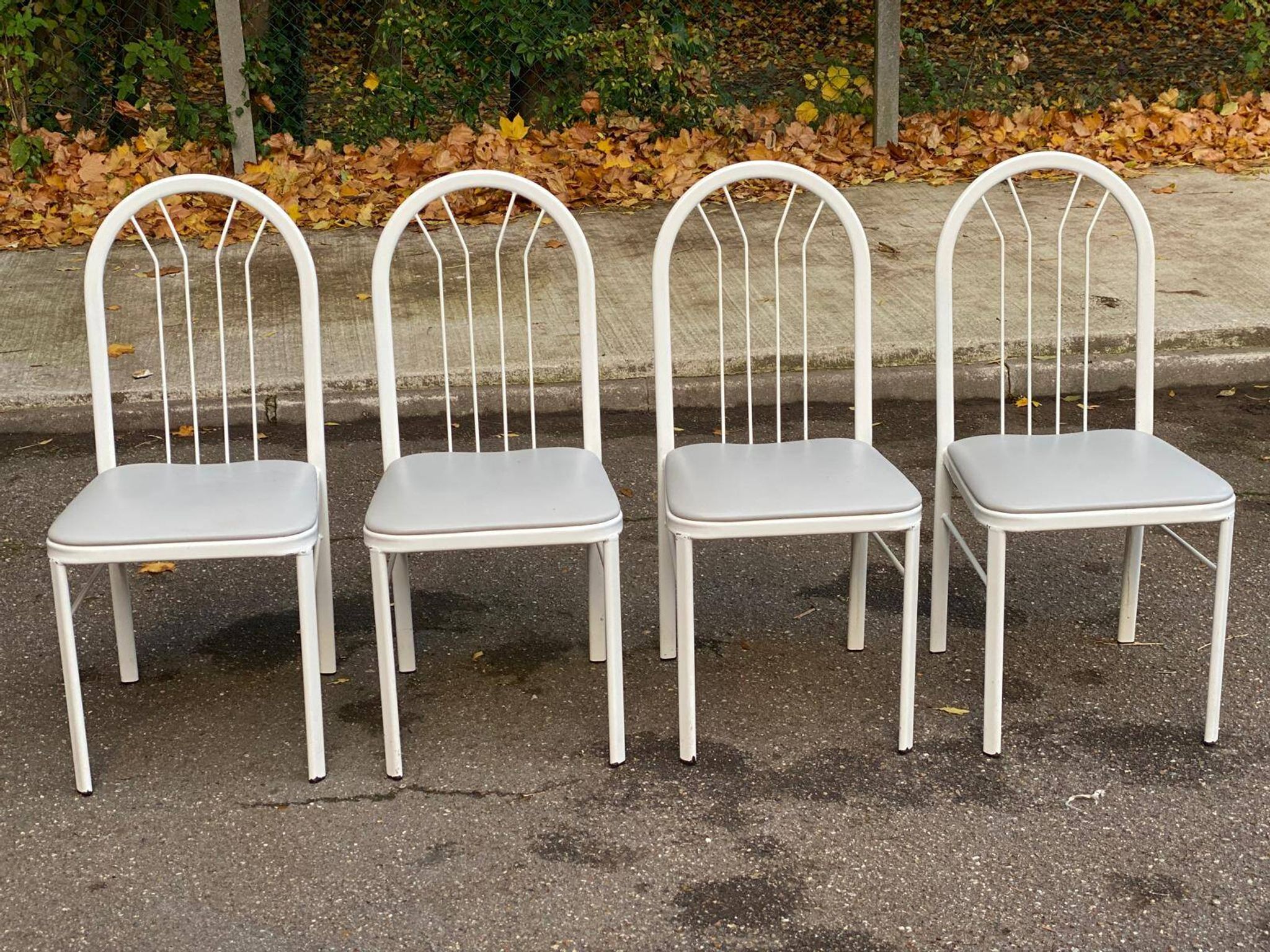 4 chairs in white steel and grey leather
