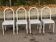4 chaises en acier blanc et cuir gris