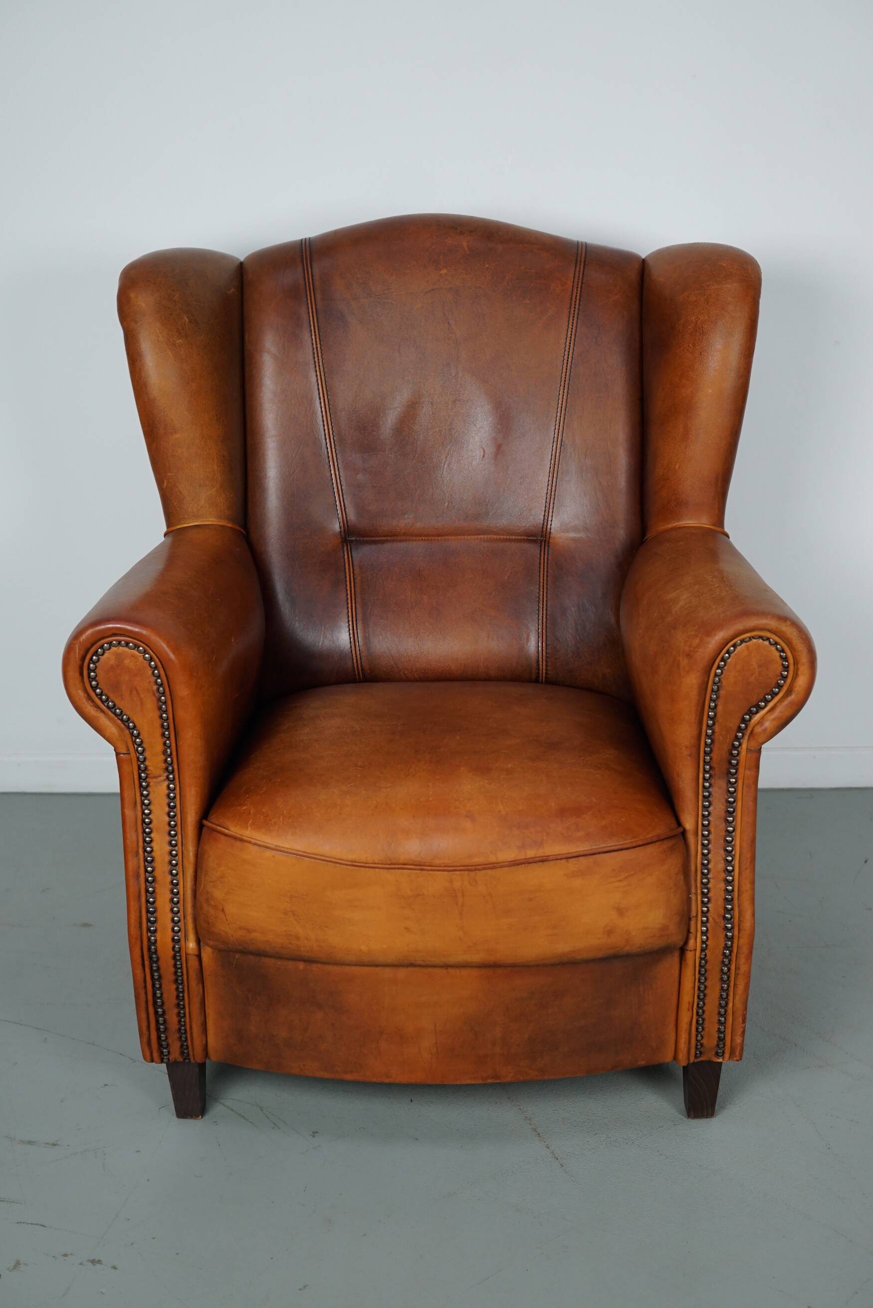 Fauteuil club vintage en cuir couleur cognac hollandais