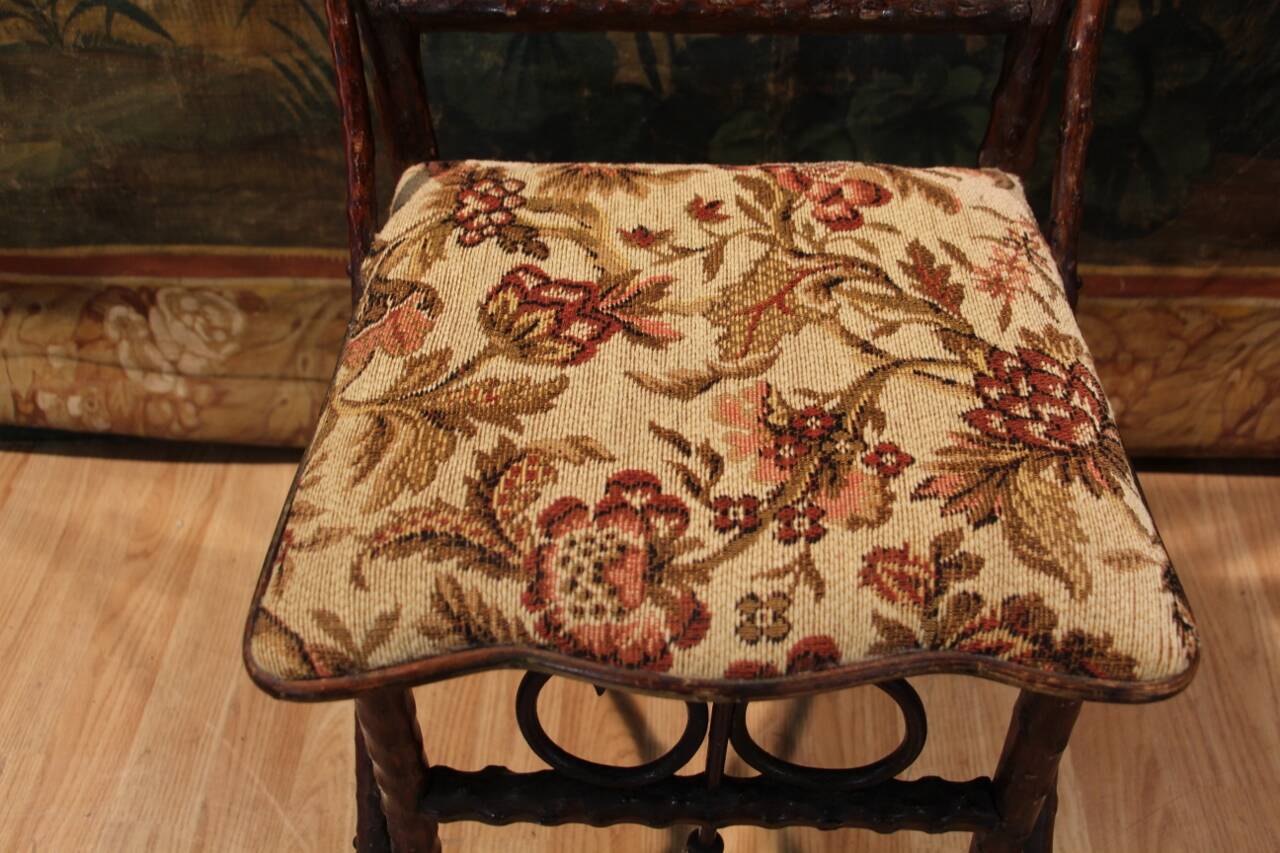 Folk art chair, black forest in branches