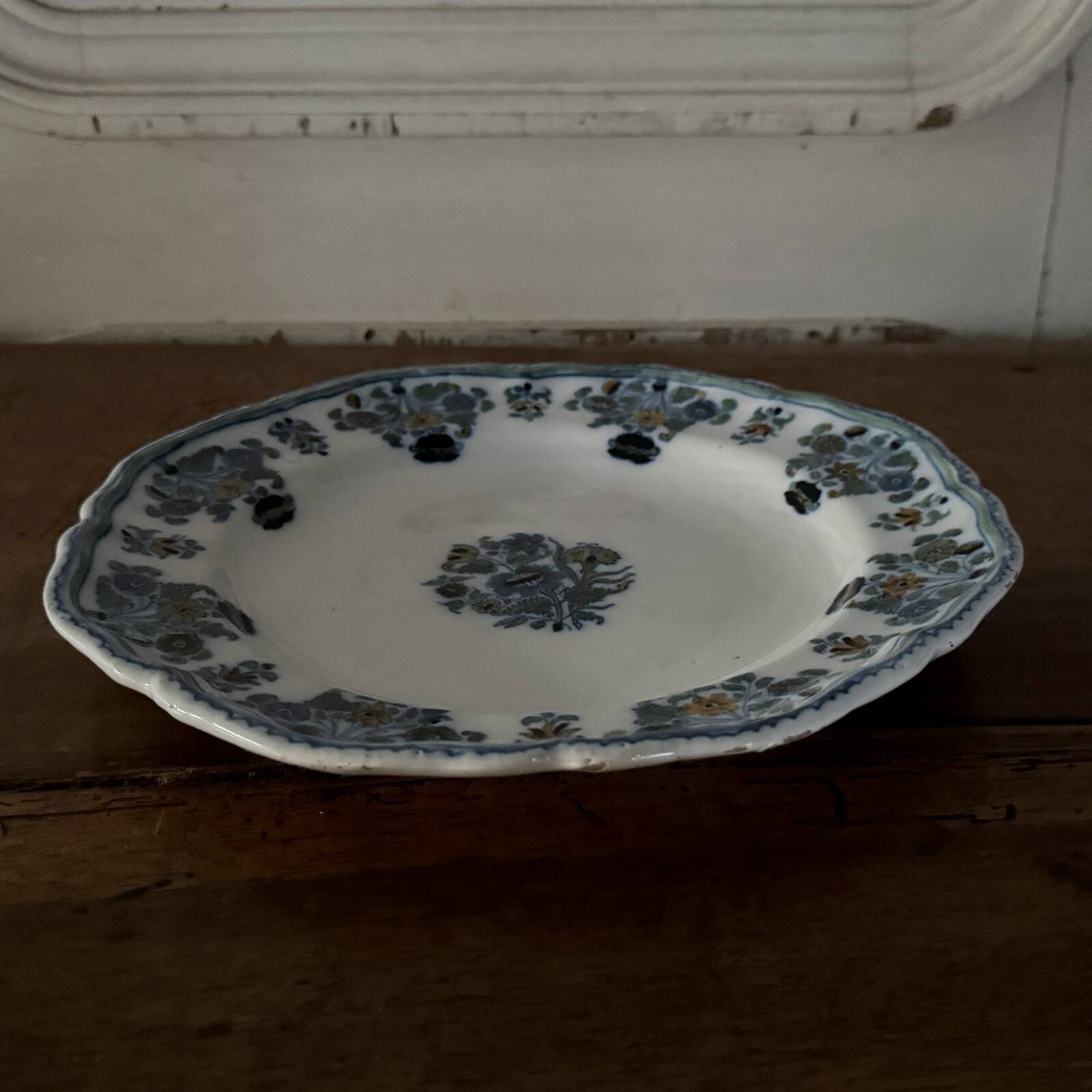 18th-century Moustiers earthenware plate with floral decoration
