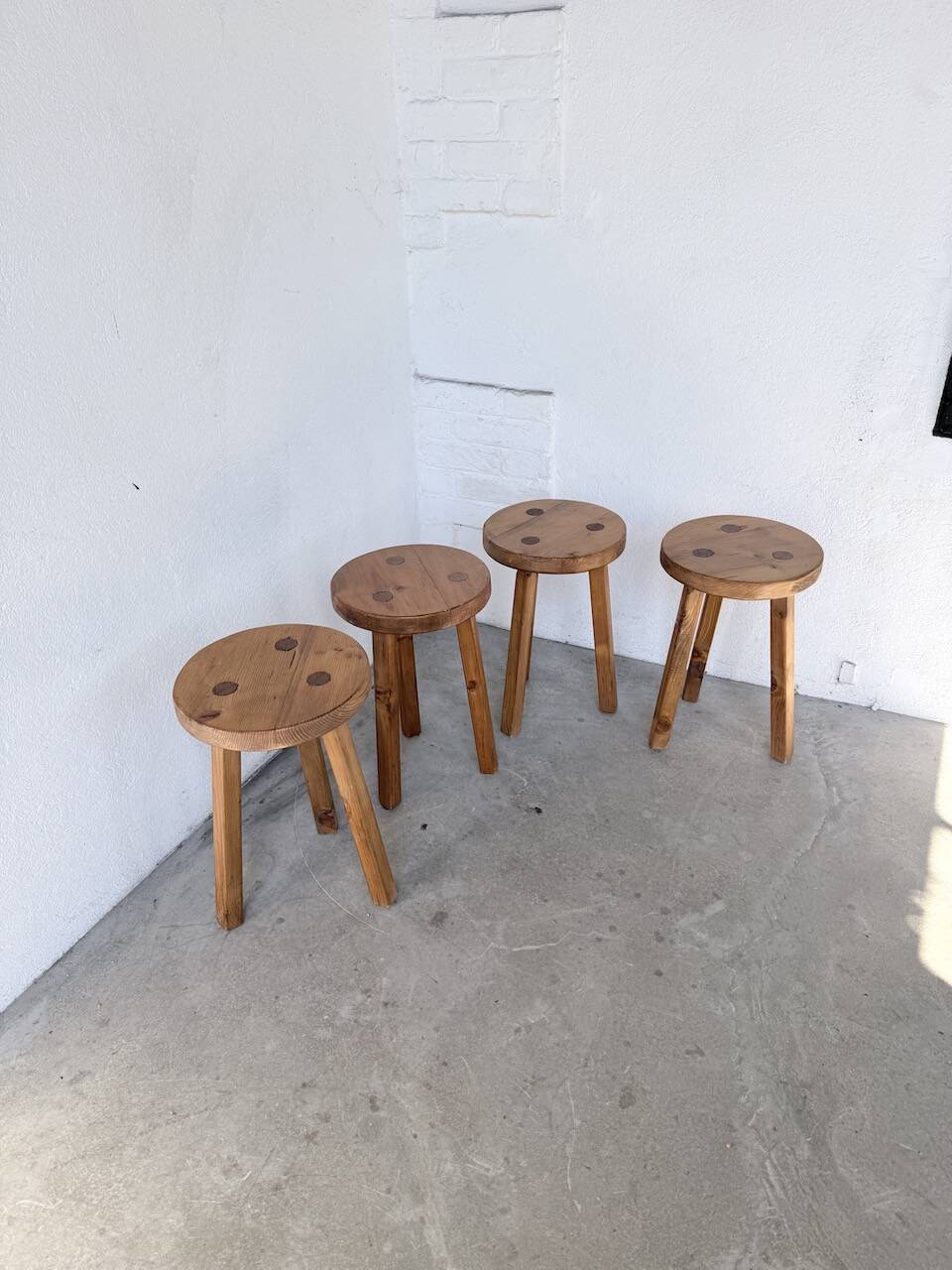 Set of 4 tripod stools from the 1950s.