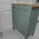 Meuble vintage en vert fumé, plateau bois.