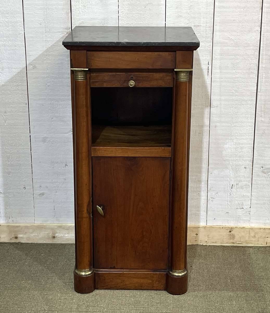 Empire bedside table from the 19th century in cherry wood and black marble.