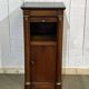 Empire bedside table from the 19th century in cherry wood and black marble.