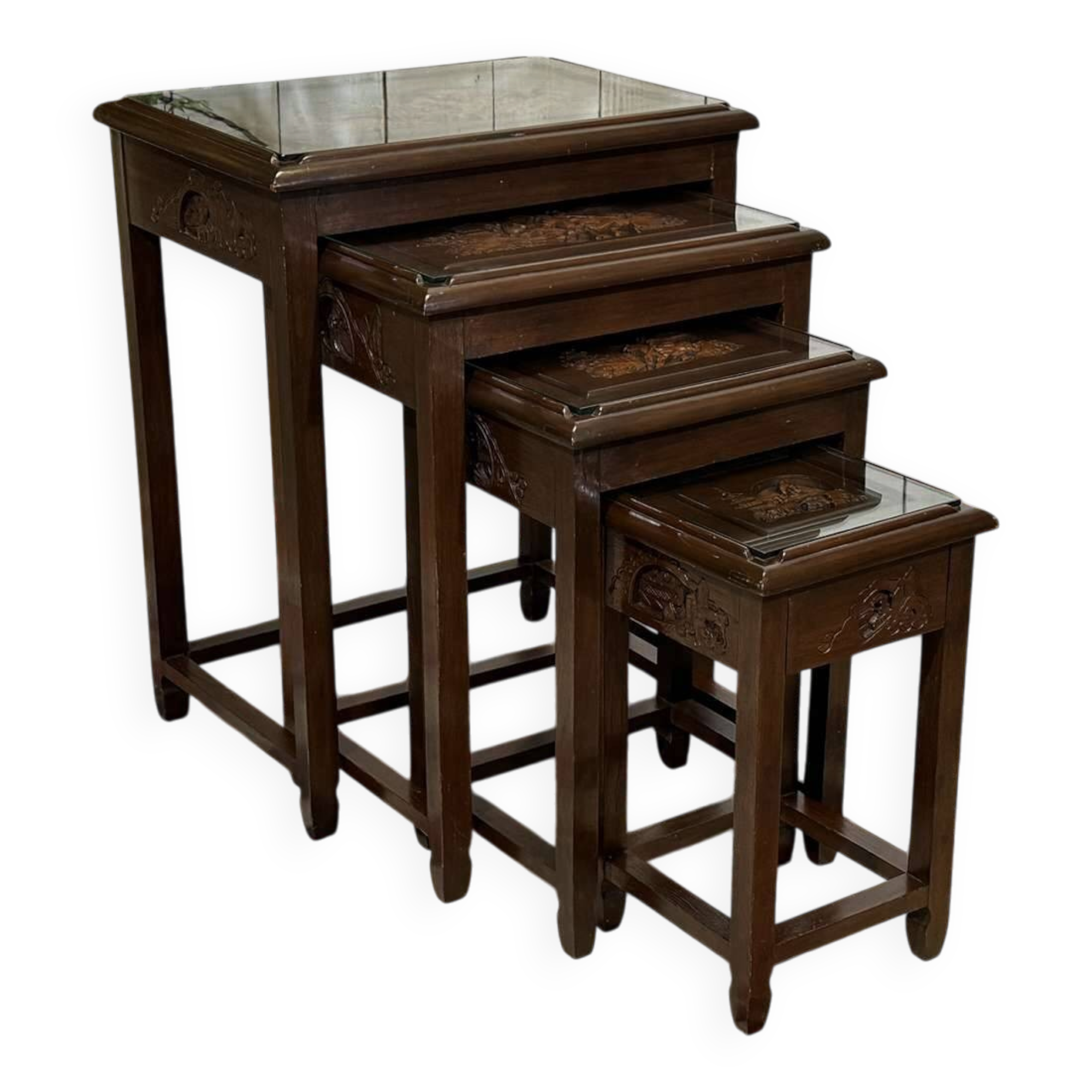 Set of 4 Chinese nesting tables in teak from the 1980s.