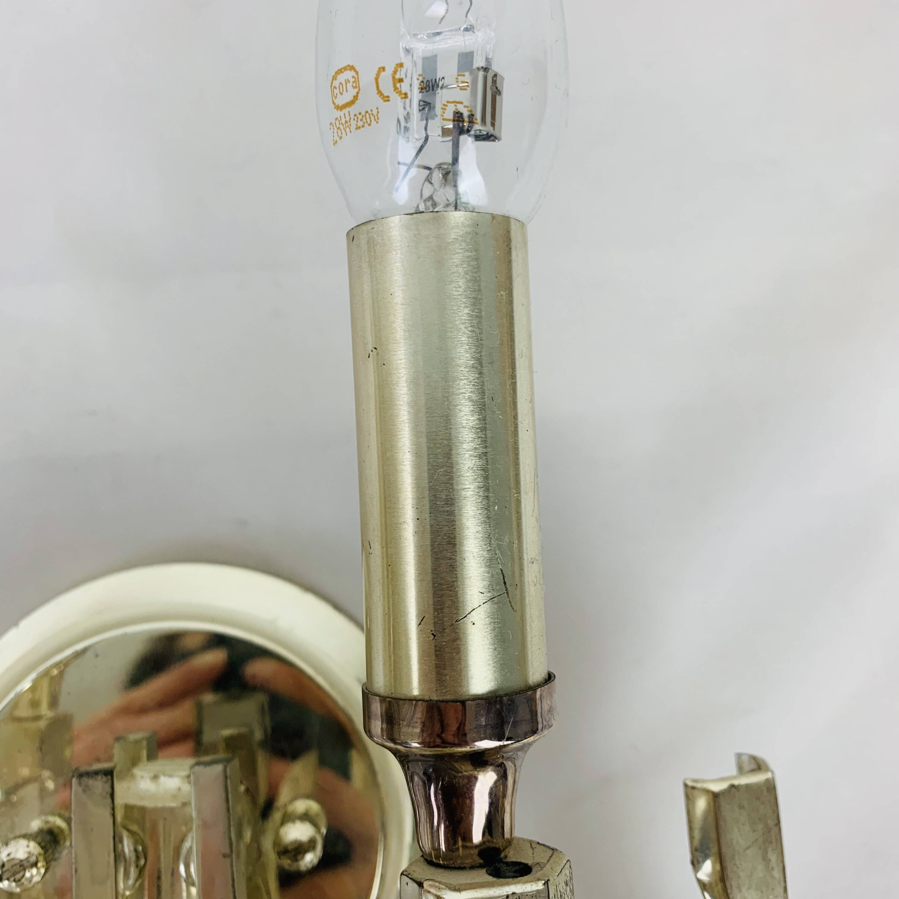 Pair of Ovali wall lights by Sciolari 70s