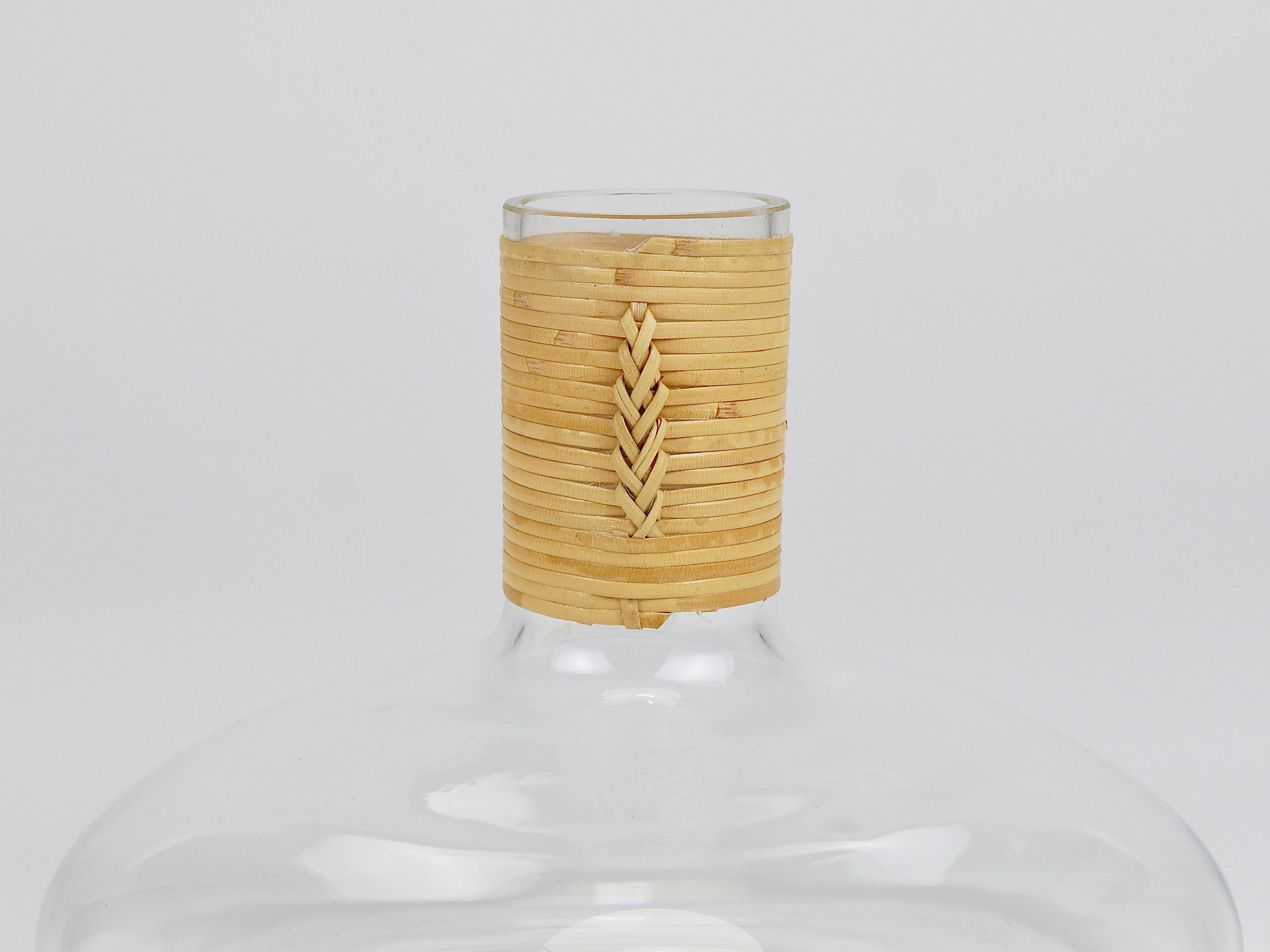 Vase by Carl Auböck decanter "Tuberkulinkolben" tall in rattan, Austria, 1950s.