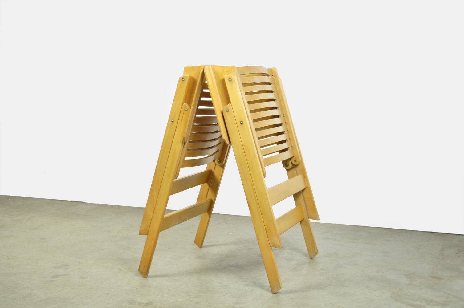 Original vintage foldable dining chairs by the Slovenian architect Niko Kralj (1920-2013) for Stol