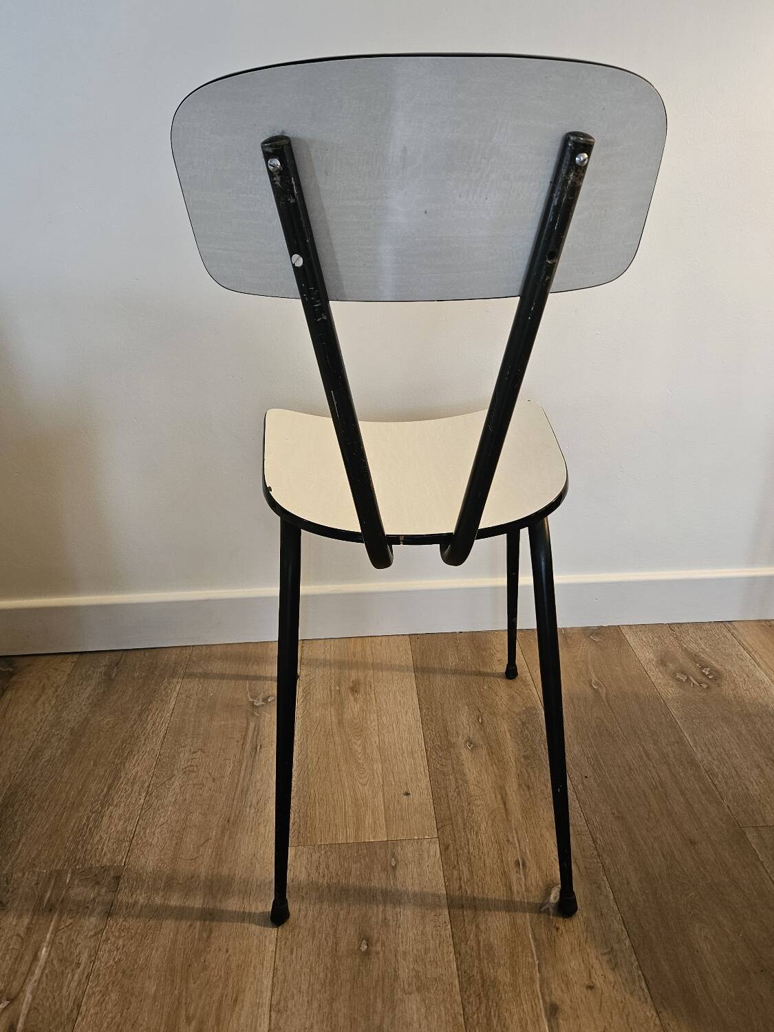Pair of white formica chairs